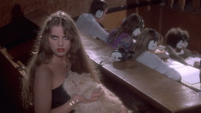 Inferno - mysterious woman with cream Persian cat in music class