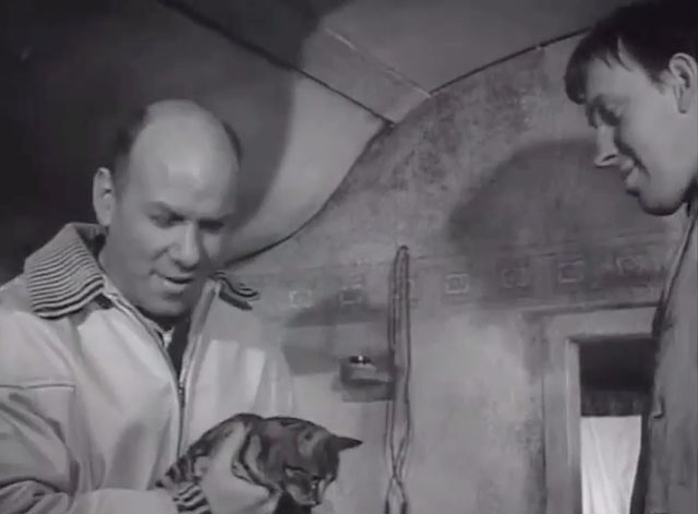 Underworld Informers - Lou Kenneth J. Warren entering room holding tabby cat