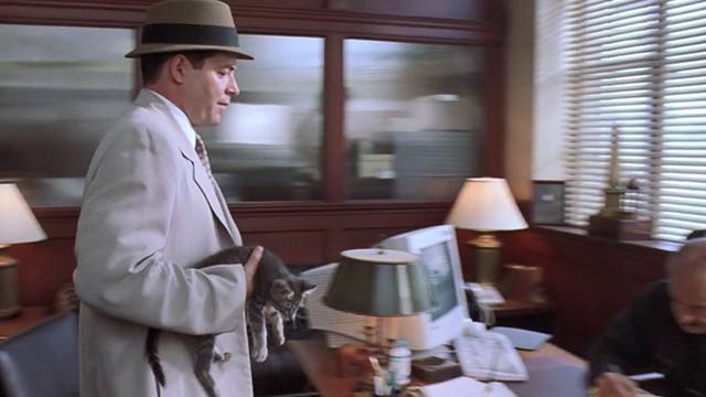 Inspector Gadget - Inspector Gadget Matthew Broderick carrying tabby kitten into Quimby's office