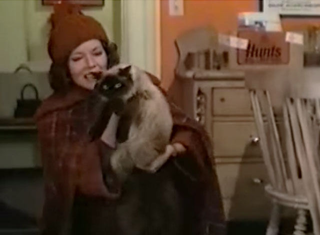 In This House of Brede - Phillipa Diana Rigg picking up seal point Himalayan cat Mr. Bumble