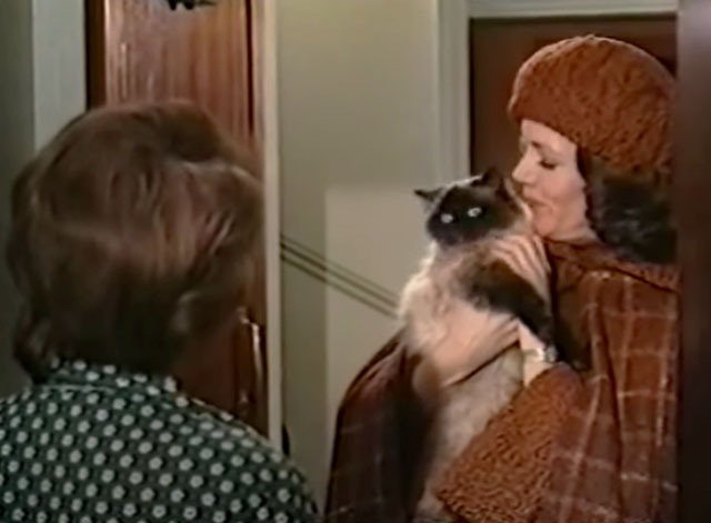 In This House of Brede - Phillipa Diana Rigg holding seal point Himalayan cat Mr. Bumble with Mrs. Fraser Charlotte Mitchell