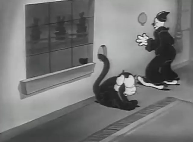 Is My Palm Read - cartoon black cat sitting by window with tail through hole and Koko the Clown nearby