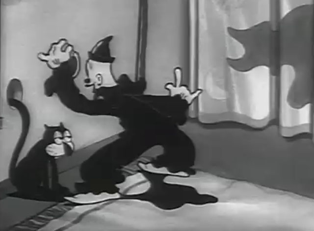 Is My Palm Read - cartoon black cat sitting by window with tail through hole and Koko the Clown nearby