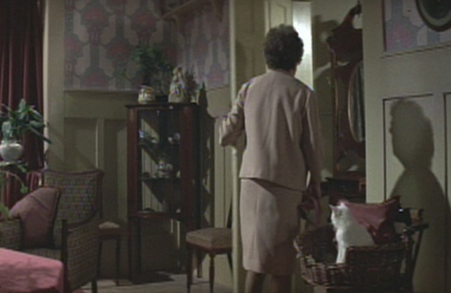 The Italian Job - white cat sitting by door when Miss Peach calls for Annette