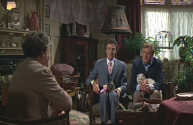 The Italian Job - Charlie and Freddie holding cats in their laps wide shot