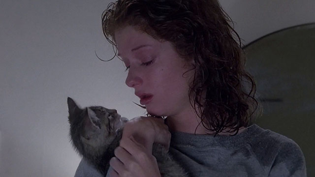 Jennifer - Lisa Pelikan crying while holding brown tabby kitten