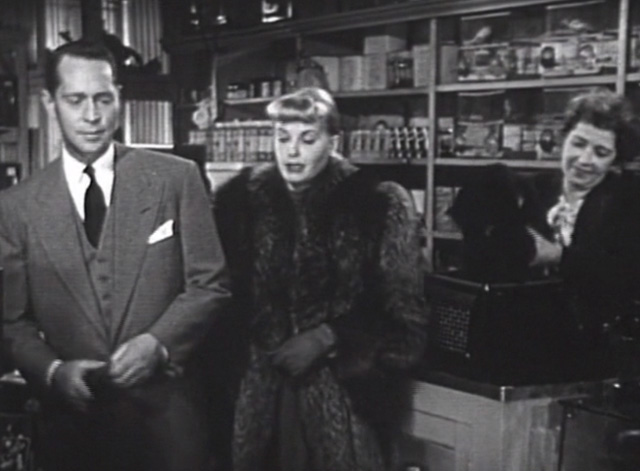 Jigsaw - Barbara Whitfield Jean Wallace with Howard Franchot Tone and clerk placing long haired black cat Bennie Benvenuto into carrier