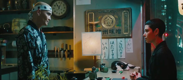 John Wick 3 Parabellum - tuxedo cat lying on counter of sushi restaurant with Zero Mark Dacascos and The Adjudicator Asia Kate Dillon