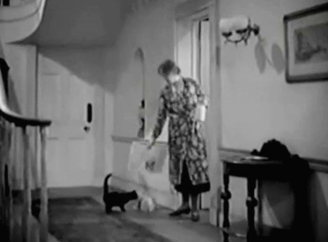 Jump for Glory - Mrs. Nolan Barbara Everest with black cat in hallway