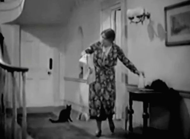 Jump for Glory - Mrs. Nolan Barbara Everest with black cat in hallway