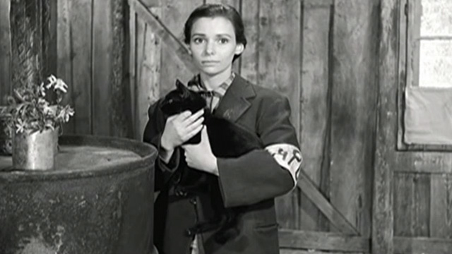 Kapo - Nicole Susan Strasberg holding black cat Faust