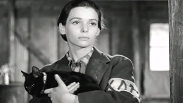 Kapo - Nicole Susan Strasberg holding black cat Faust