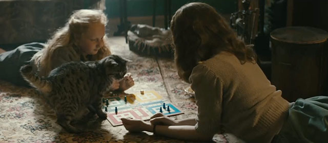The Keeper - Margaret Freya Mavor and Barbara Olivia-Rose Minnis playing Ludo with British shorthair cat Presley