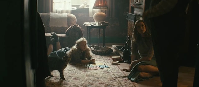 The Keeper - Margaret Freya Mavor and Barbara Olivia-Rose Minnis playing with British shorthair cat Presley