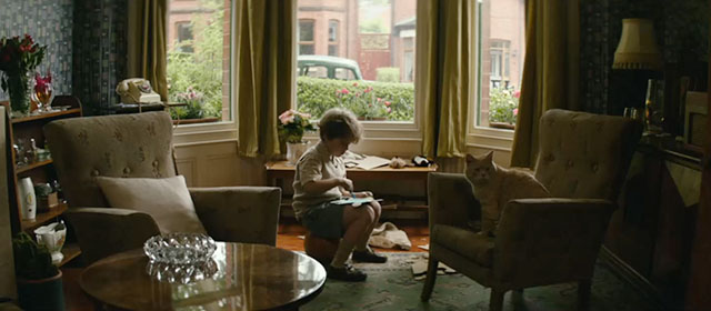 The Keeper - John Tobias Masterson with ginger tabby cat on chair
