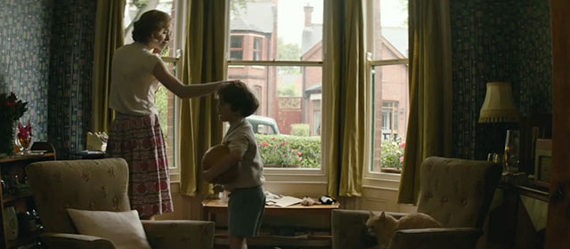 The Keeper - Maragaret Freya Mavor and John Tobias Masterson with ginger tabby cat on chair