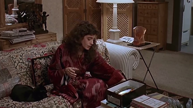A Kiss Before Dying - black cat Pepe on couch with Ellen Sean Young