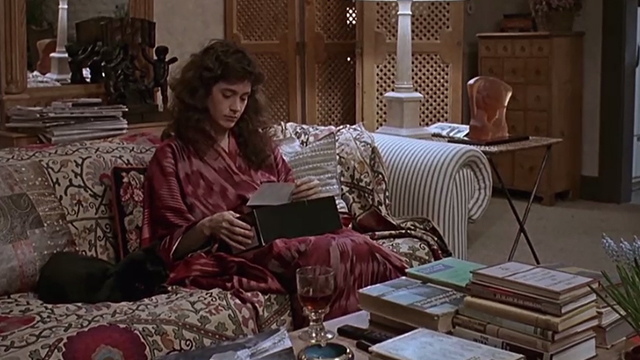 A Kiss Before Dying - black cat Pepe on couch with Ellen Sean Young