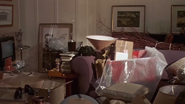 A Kiss Before Dying - black cat Pepe on arm of couch