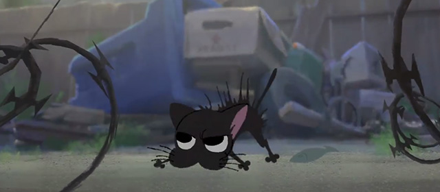 Kitbull - feisty black kitten defending cardboard box home