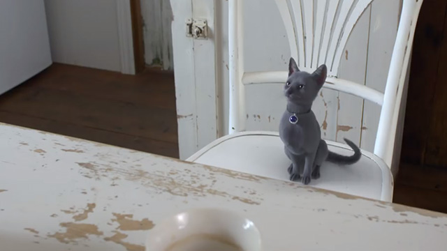 Kitten Witch - Freda gray kitten sitting at table
