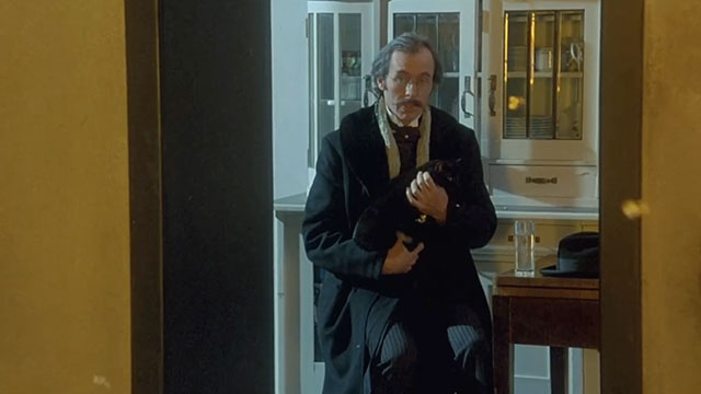 Klimt - secretary Stephen Dillane holding black cat