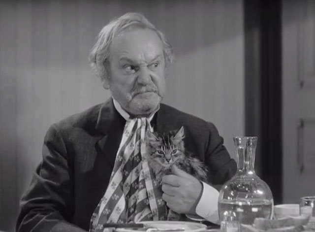 Klondike Kate - Judge Crossit George Cleveland at table with small tabby cat Mr. Blackstone