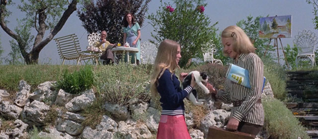 Knife of Ice - Il coltello di ghiaccio - Christina Rosa M. Rodriguez showing black and white kitten to Martha Carroll Baker
