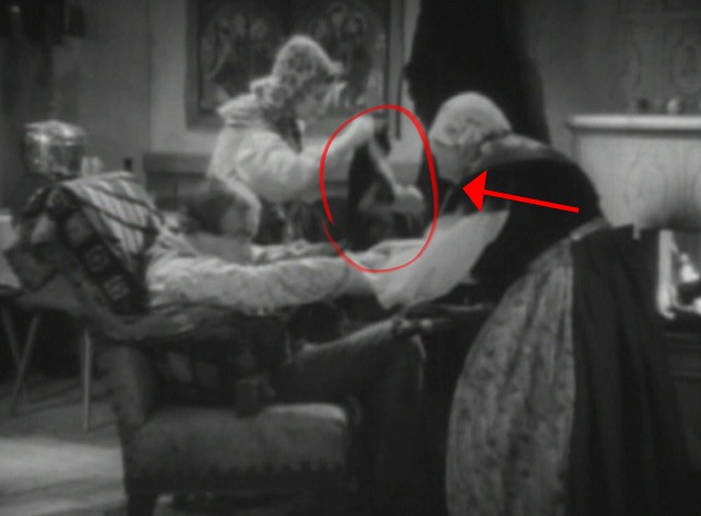 A Lady's Morals - black and white cat being tossed off lap