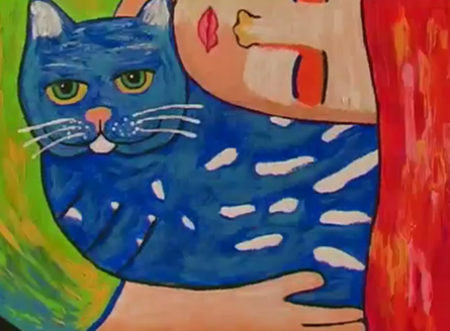 L'anima mavi - orange cat turned blue with woman