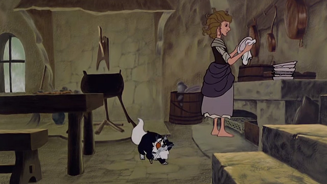 The Last Unicorn - pirate cat lying on floor behind Molly in kitchen