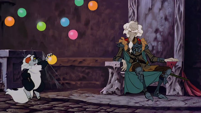 The Last Unicorn - pirate cat jumping after glowing ball in front of King Haggard