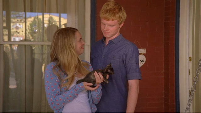 Lemonade Mouth - Olivia Bridgit Mendler holding tortoiseshell kitten with Wen Adam Hicks