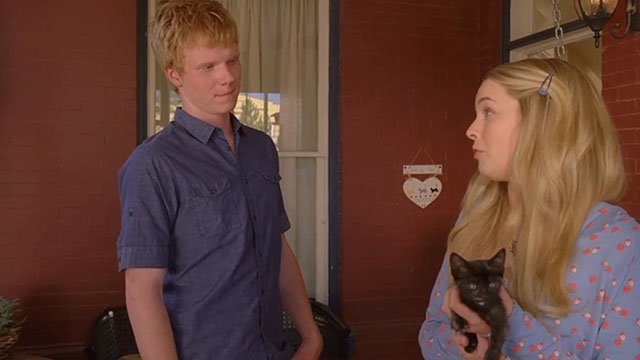 Lemonade Mouth - Olivia Bridgit Mendler holding tortoiseshell kitten with Wen Adam Hicks