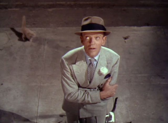 Let's Dance - Donald Elwood Fred Astaire on street with cats and kittens coming to his feet