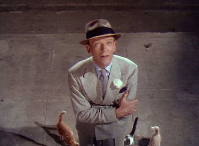 Let's Dance - Donald Elwood Fred Astaire on street with cats and kittens coming to his feet