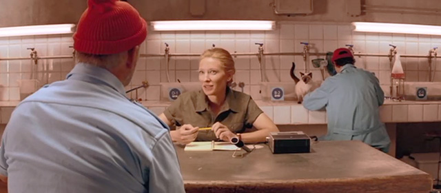 The Life Aquatic with Steve Zissou - Siamese cat on counter behind Jane Cate Blanchett