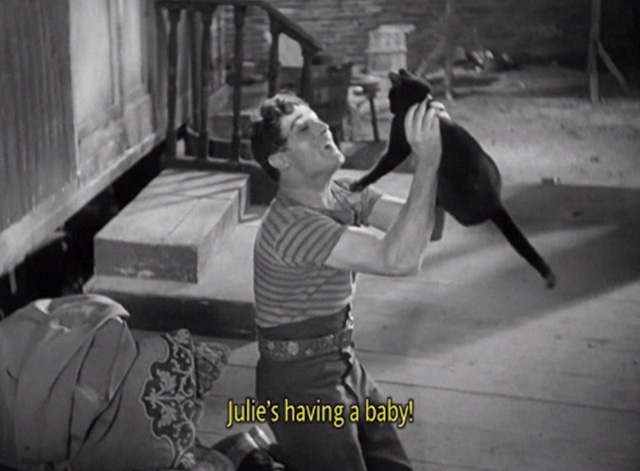Liliom - Liliom Charles Boyer holding up black cat