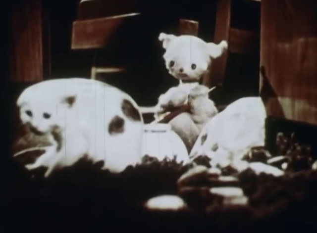 Little Kitten - white kitten with black markings trapped under glass bowl with twine cat puppet trying to rescue them