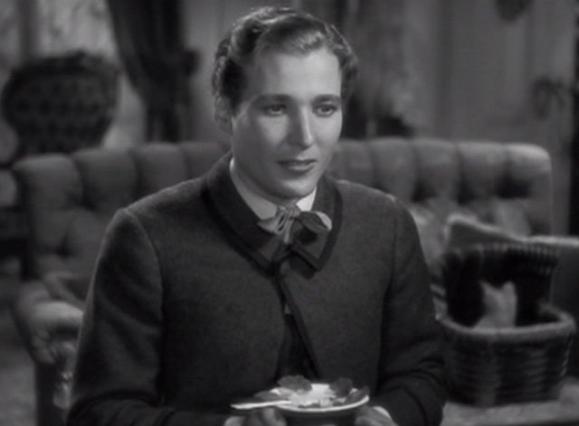 Little Women - Laurie Douglass Montgomery sitting with tabby kitten popping out of basket in background