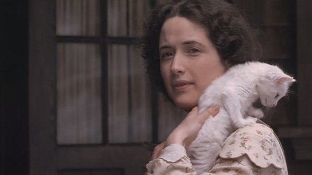 Little Women - Beth Claire Danes with white kitten over shoulder
