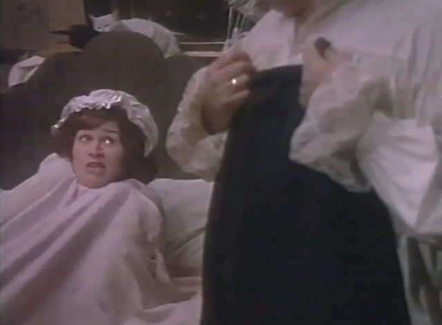 Lock Up Your Daughters - Nurse Patricia Routledge in bed with cats behind her