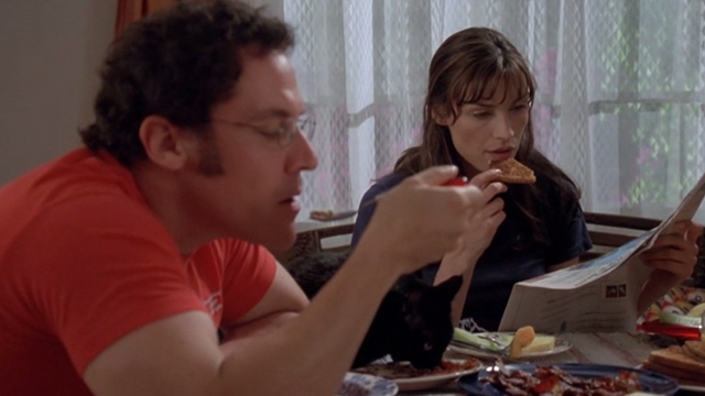 Love & Sex - Adam Jon Favreau and Kate Famke Janssen eating breakfast with black cat between them on table