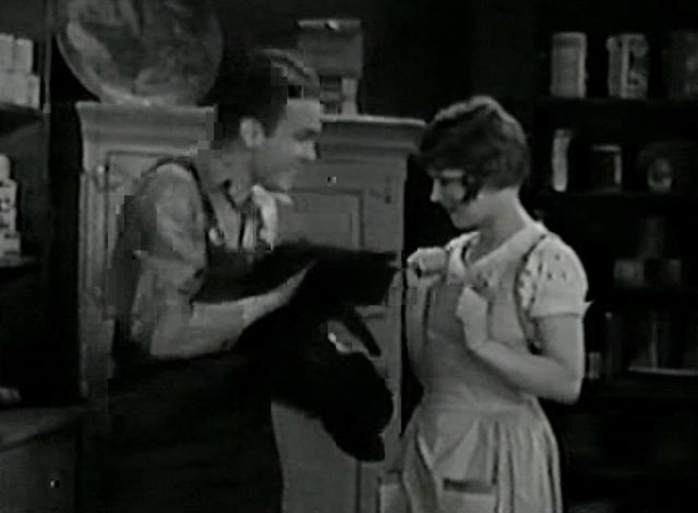 Love Among the Millionaires - Jerry Stanley Smith handing longhair black cat to Pepper Clara Bow