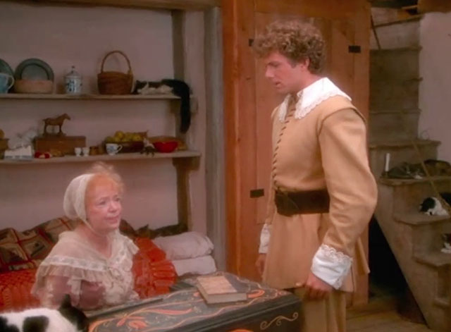 Love at Stake - Aunt Deliverence Norma MacMillan at piano surrounded by cats with Miles Patrick Cassidy