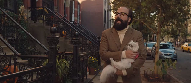 Lyle Lyle Crocodile - silver Persian longhair cat Loretta held by Mr. Grumps Brett Gelman