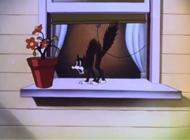 The Mad Hatter - cartoon black cat arching back on windowsill