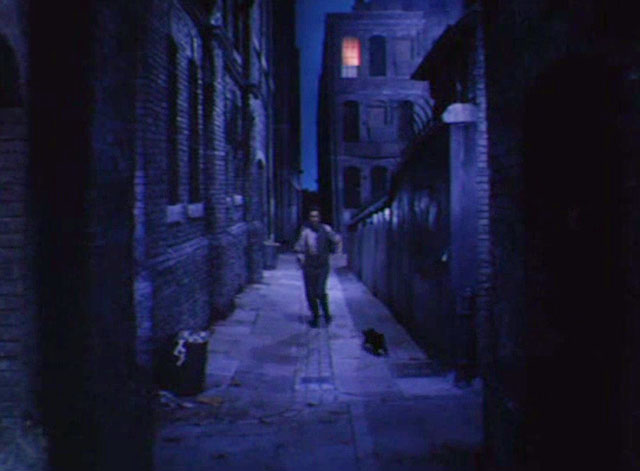 The Magic Box - black cat running up alley ahead of William Friese-Greene Robert Donat