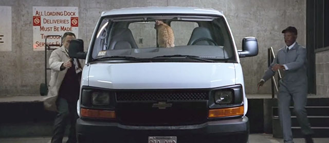 The Maiden Heist - Charles Morgan Freeman and Roger Christopher Walken climbing into van with ginger tabby cat Renoir on dashboard