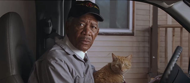 The Maiden Heist - Charles Morgan Freeman with ginger tabby cat Renoir in van